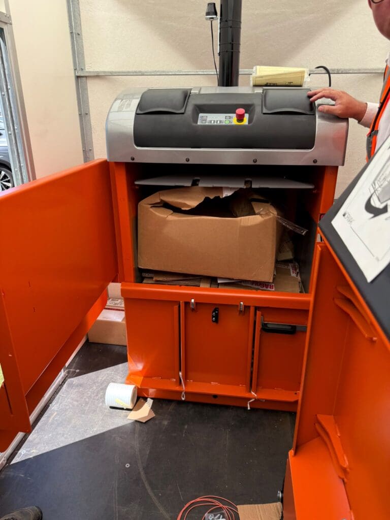 carboard baler on the Falcon truck